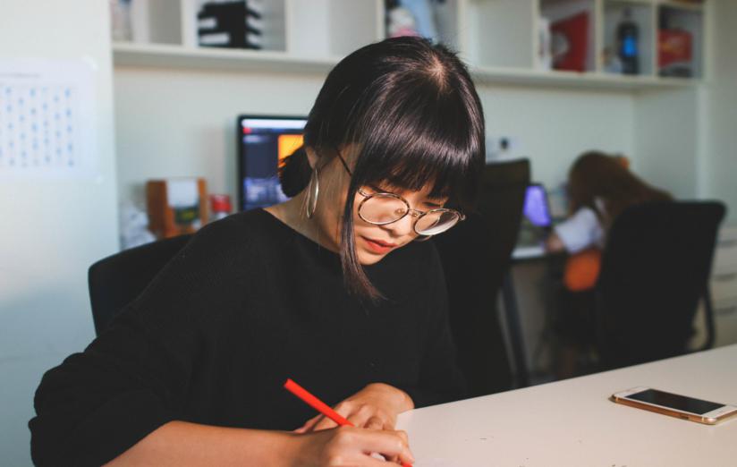 A Girl Studying Image